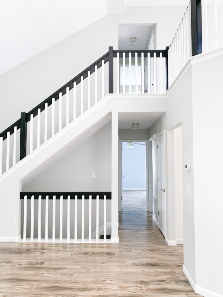 black and white painted staircase with benjamin moore paint