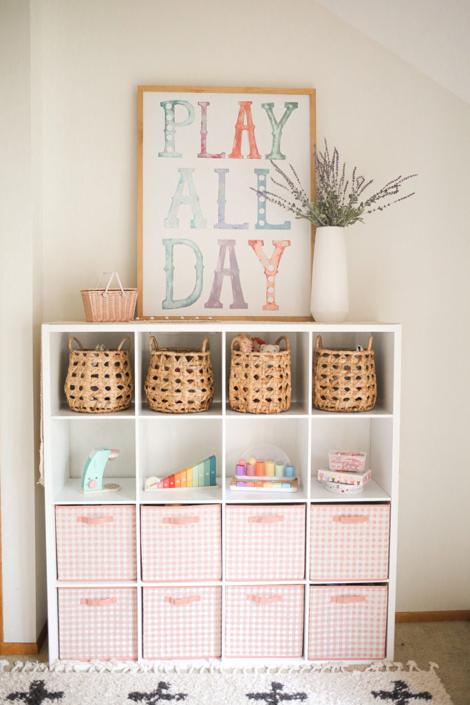 neutral playroom storage and shelves