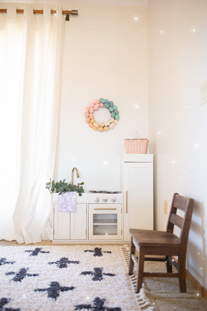 pottery barn kids white play kitchen in neutral playroom