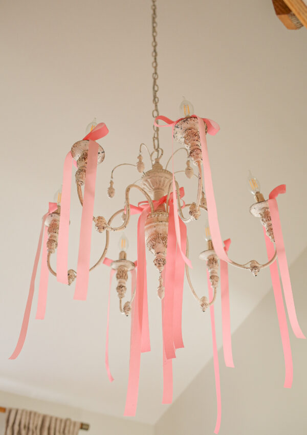 pink bows on chandelier