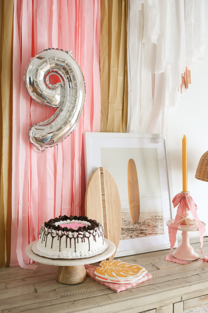 pink palm puff birthday party decor